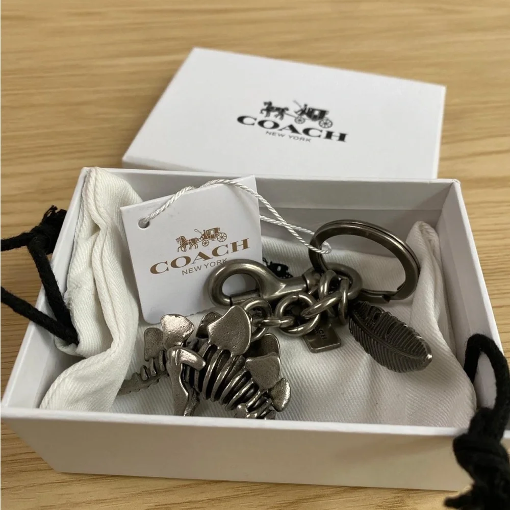 Coach Silver-Tone Stegosaurus & Feather Keyring Charm